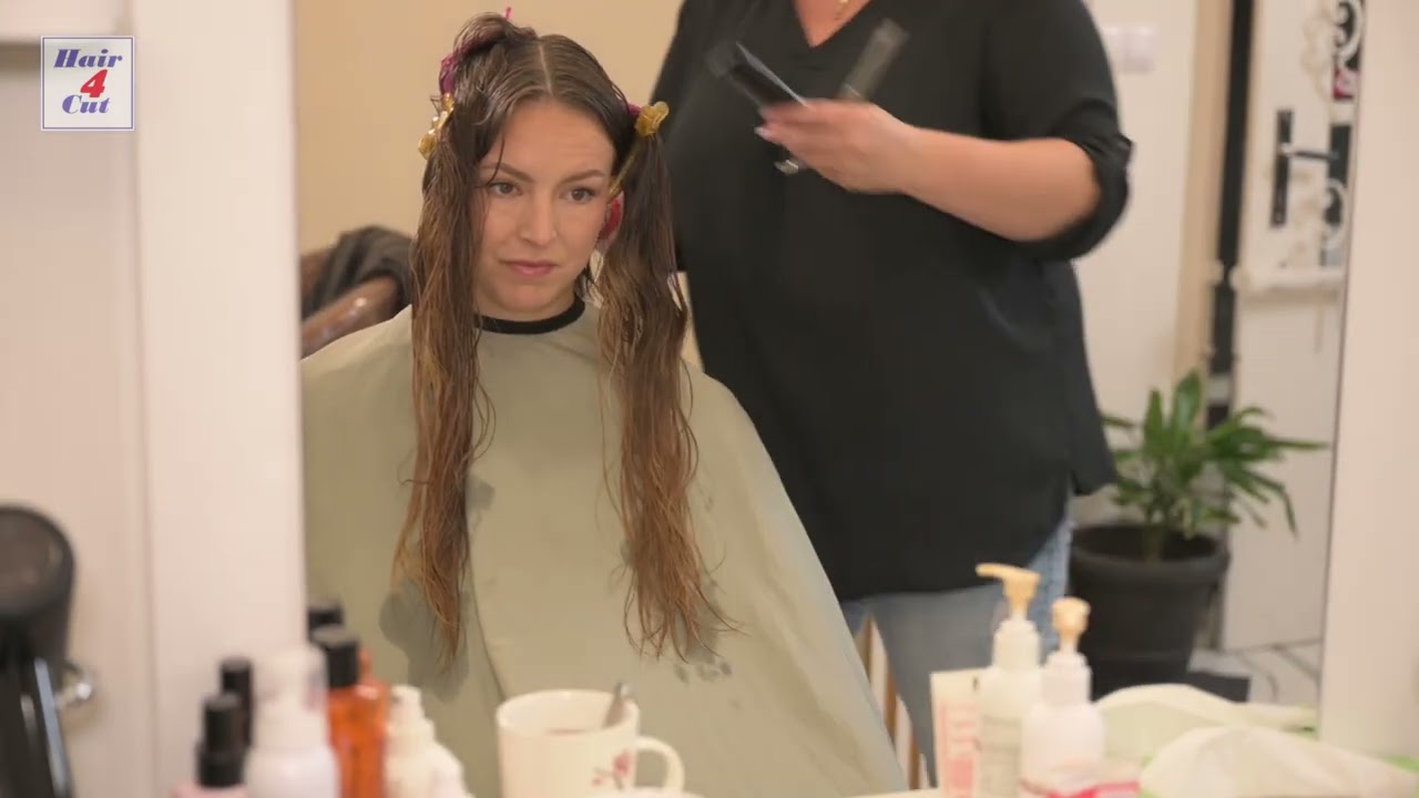 2025-05 Nela preview - beauty cuts her long hair to bob
