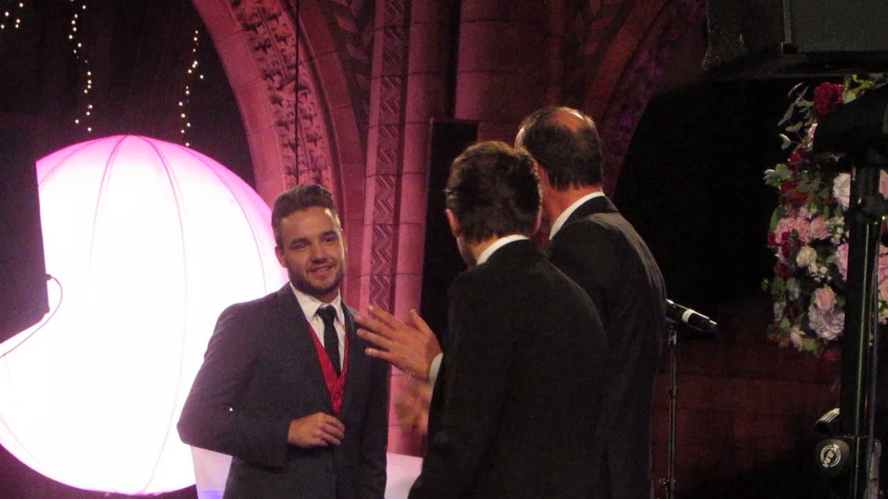 Louis & Liam bidding at Believe In Magic ball 10.08.2015