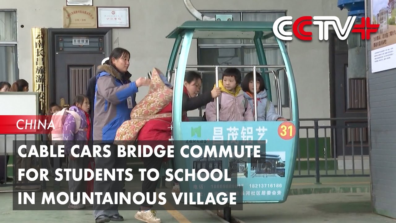 Cable Cars Bridge Commute for Students to School in Mountainous Village