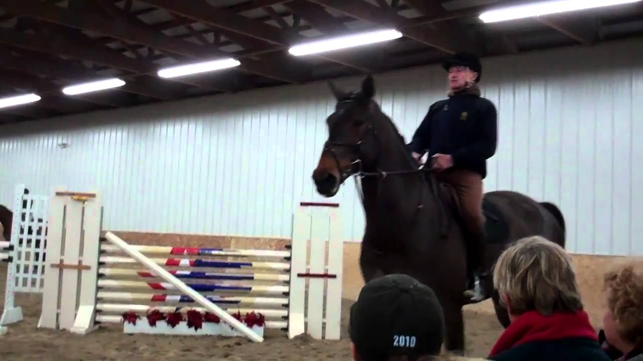George Morris Suppling a Horse