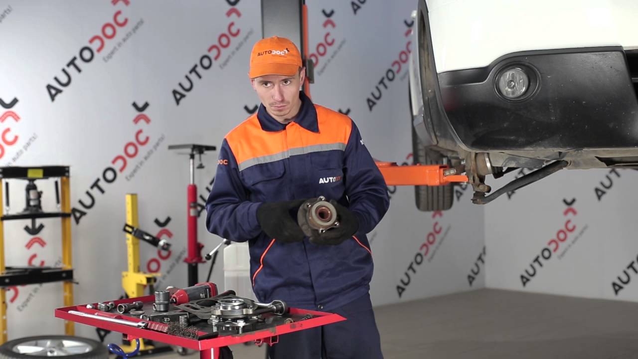 Hoe een voor wiellager op een NISSAN QASHQAI 1 vervangen HANDLEIDING | AUTODOC