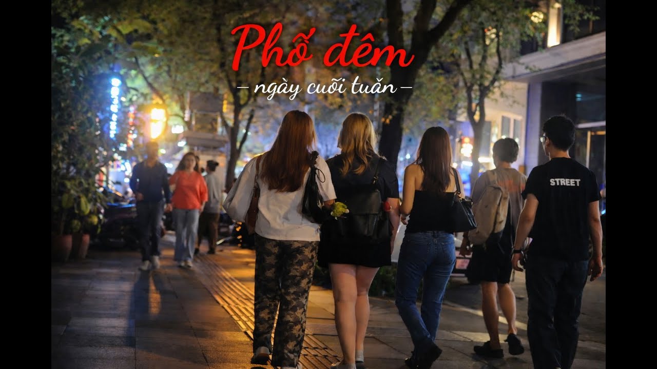 phố đêm sài gòn nhộp nhịp người qua lạ |i khách du lịch đi dạo | các cập đôi tay trong tay dạo phố