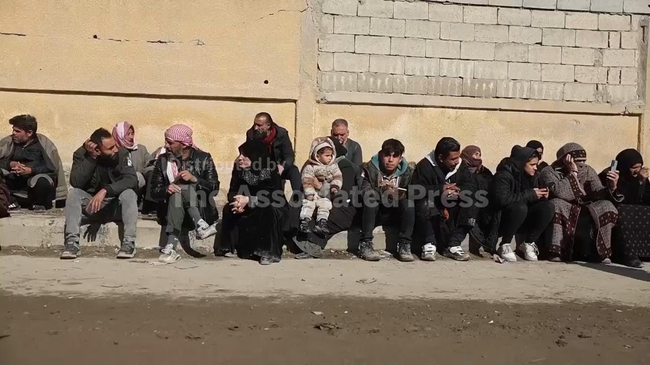 Families of Syrians detained at al-Aqtan prison gather in Raqqa, hoping for their release