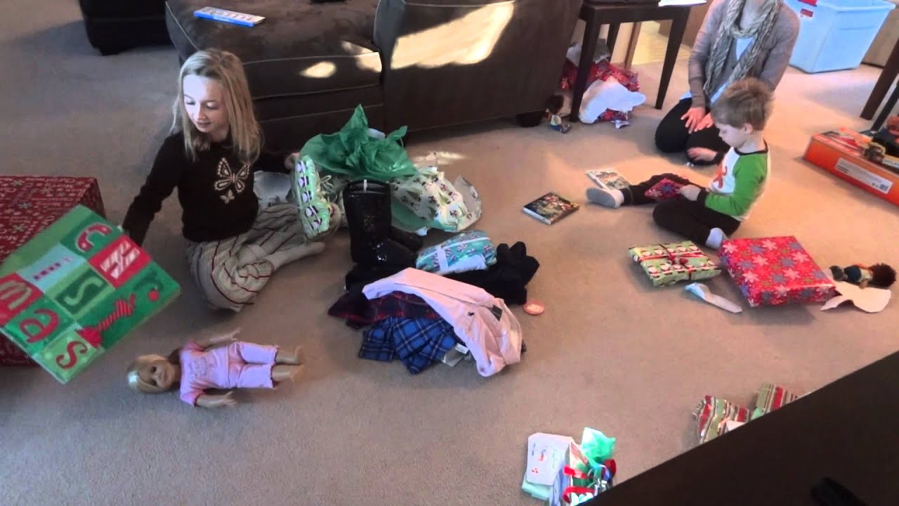 Emma & George opening gifts Christmas Day 2011
