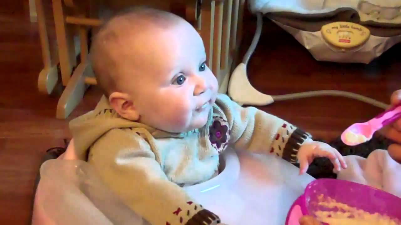 Sydney's first time eating solids
