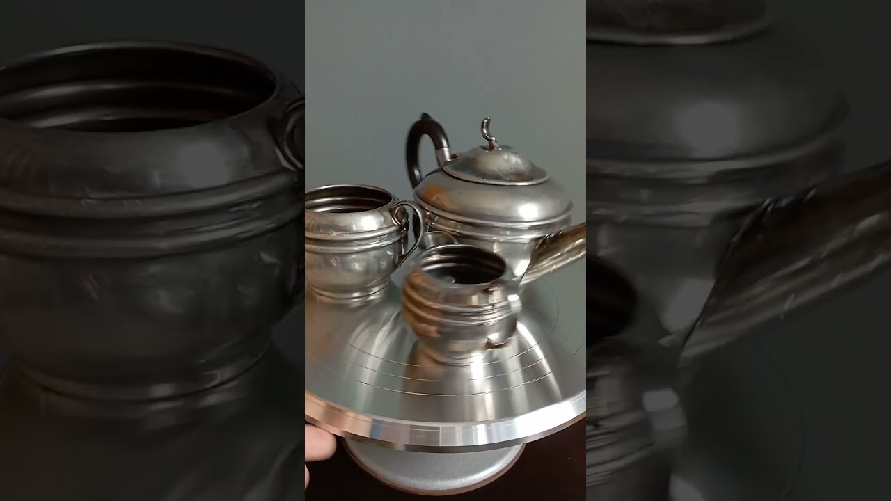 Antique silver-plated, English tea set. teapot, milk jug, sugar bowl.