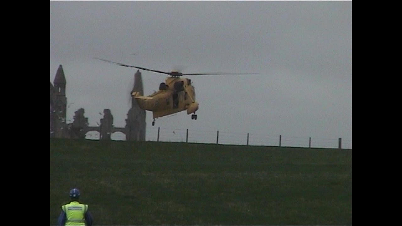 Seaking helicopter ditches in field while on a rescue making a very hard landing.