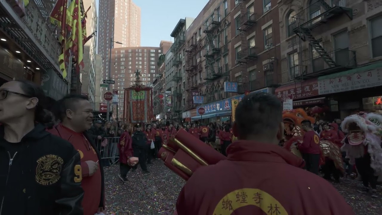 Young Lions paying respect passing by Souther Prey Mantis School, Bayard St.  Chinatown NYC 02/28/26