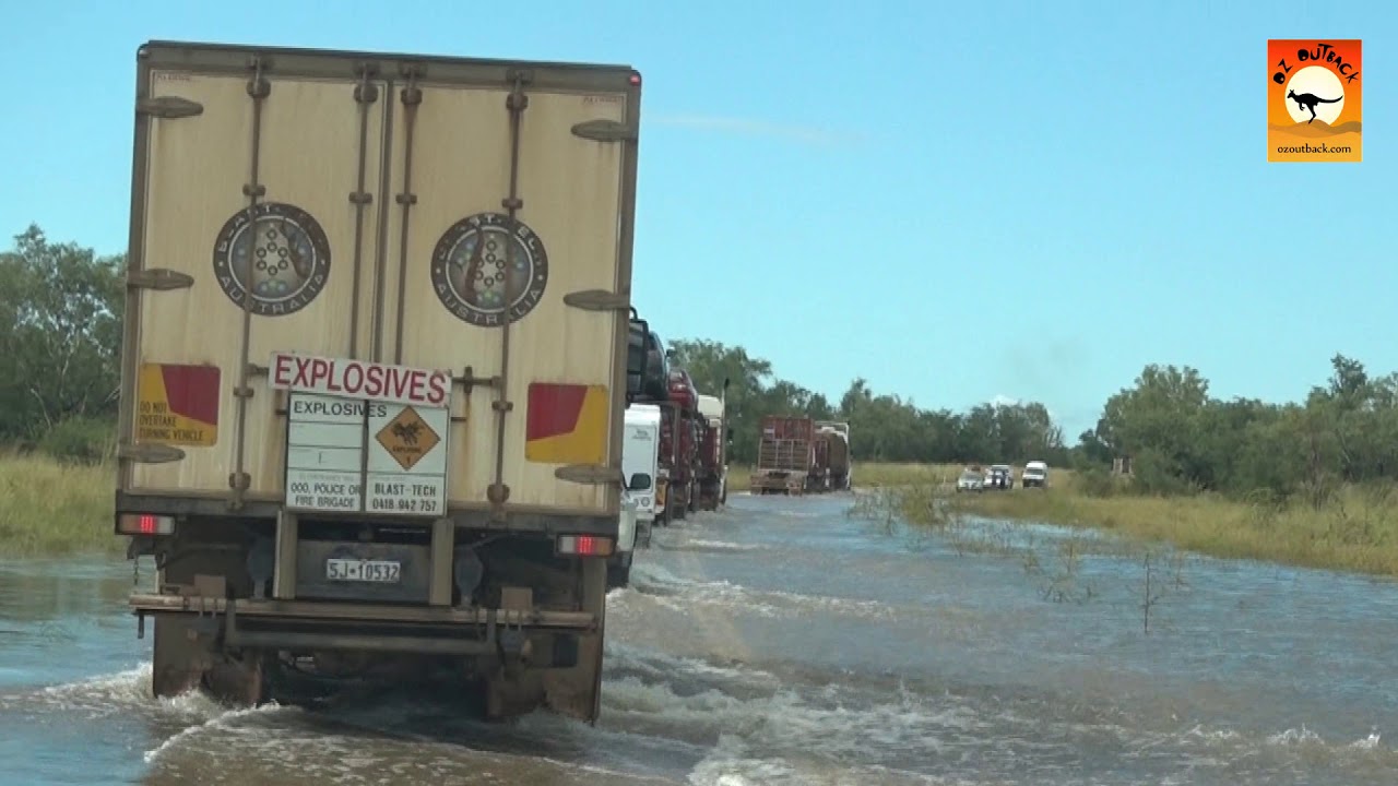 Following massive road trains through flooded waters in outback Australia - OzOutback Truckers