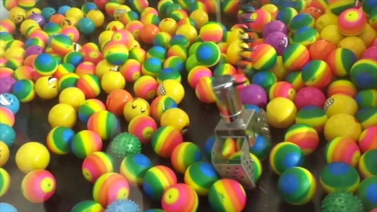 Finding three free plays on claw machine at Walmart