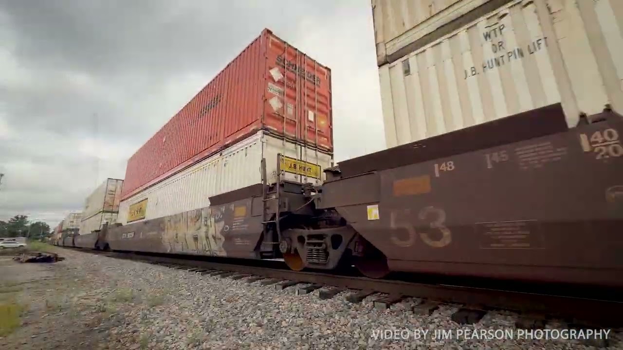 CSX intermodal train, I128, heads north across Sugg Street, Madisonville, Ky