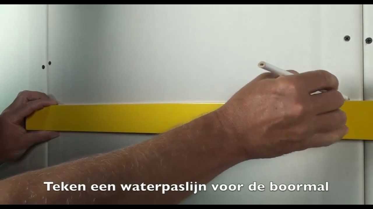 Flatscreen TV met zwenkarm aan gipsplaat met TOGGLER Pluggen & Ankers