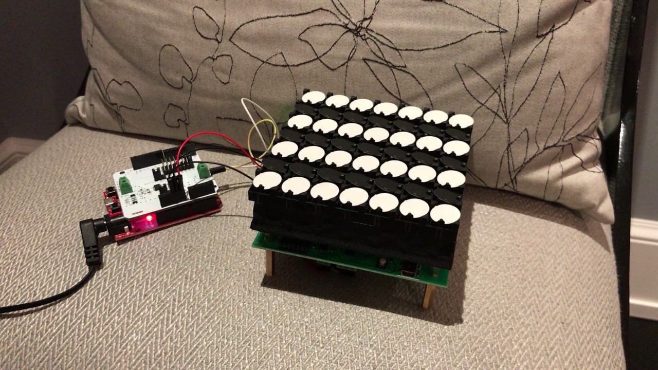 Particle Photon-controlled electromagnetic flip disc display (Alfa-Zeta Flip-Dots)