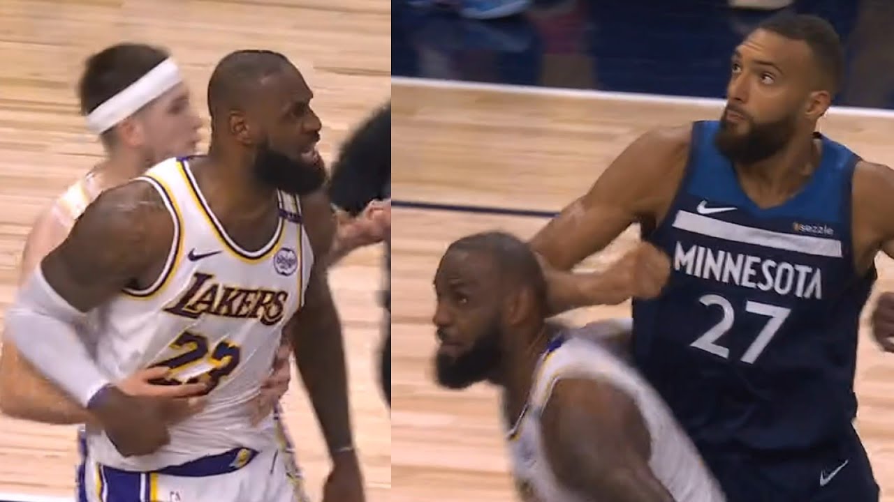 LeBron James held back from Rudy Gobert after Rudy elbowed him in back of head 😳