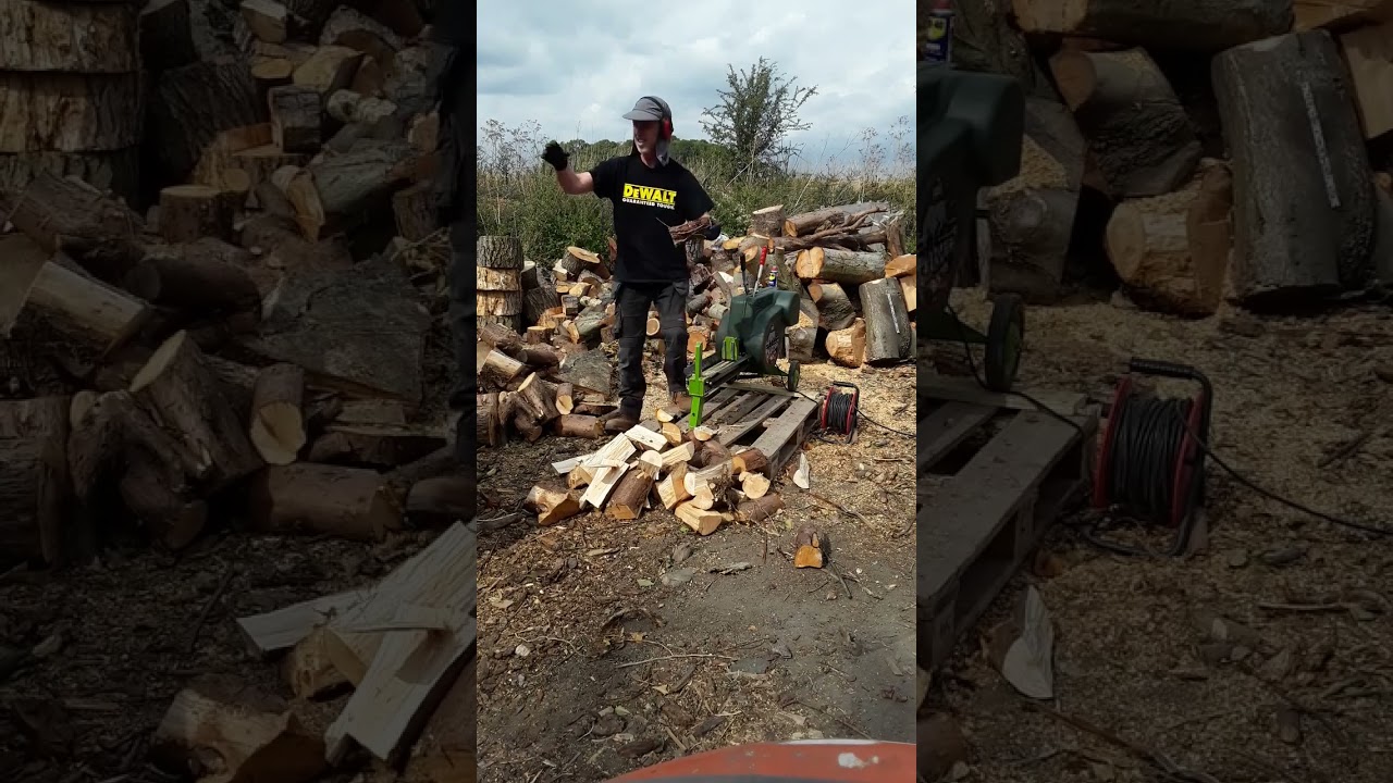 Fred splitting logs with the Portek charger log Splitter