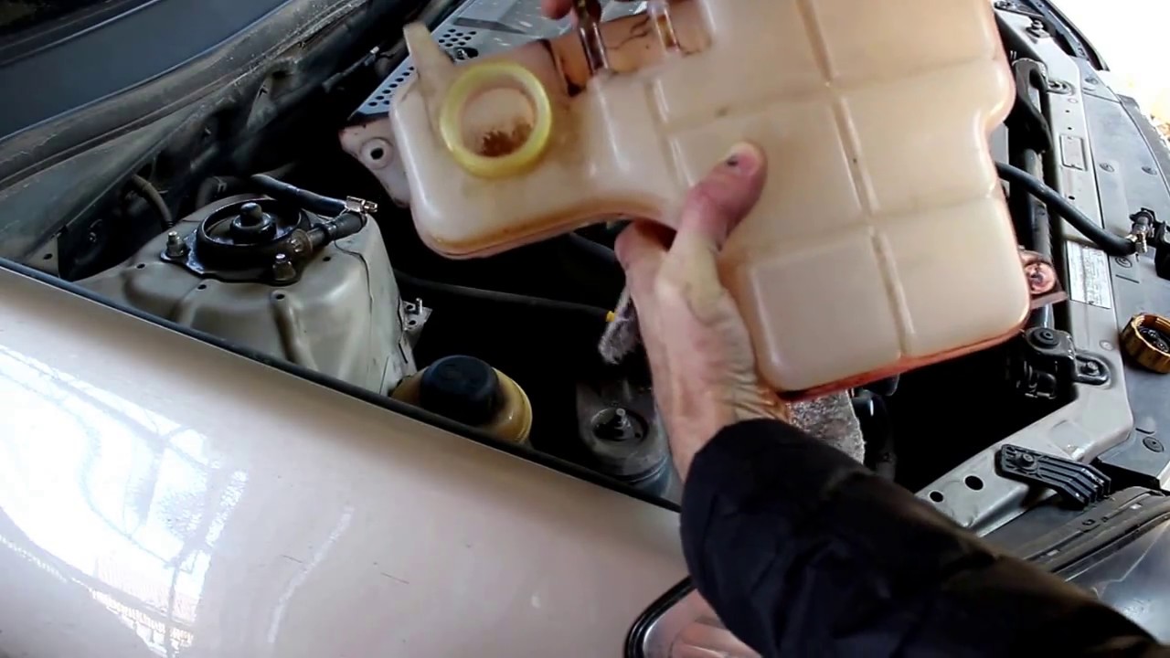 Chevrolet Epica Шевроле Эпика Потек расширительный бачок ,ремонтируем