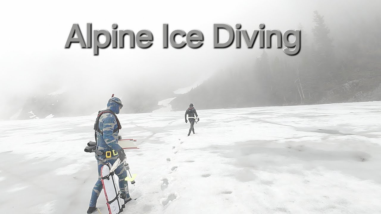 Ice diving alpine lake