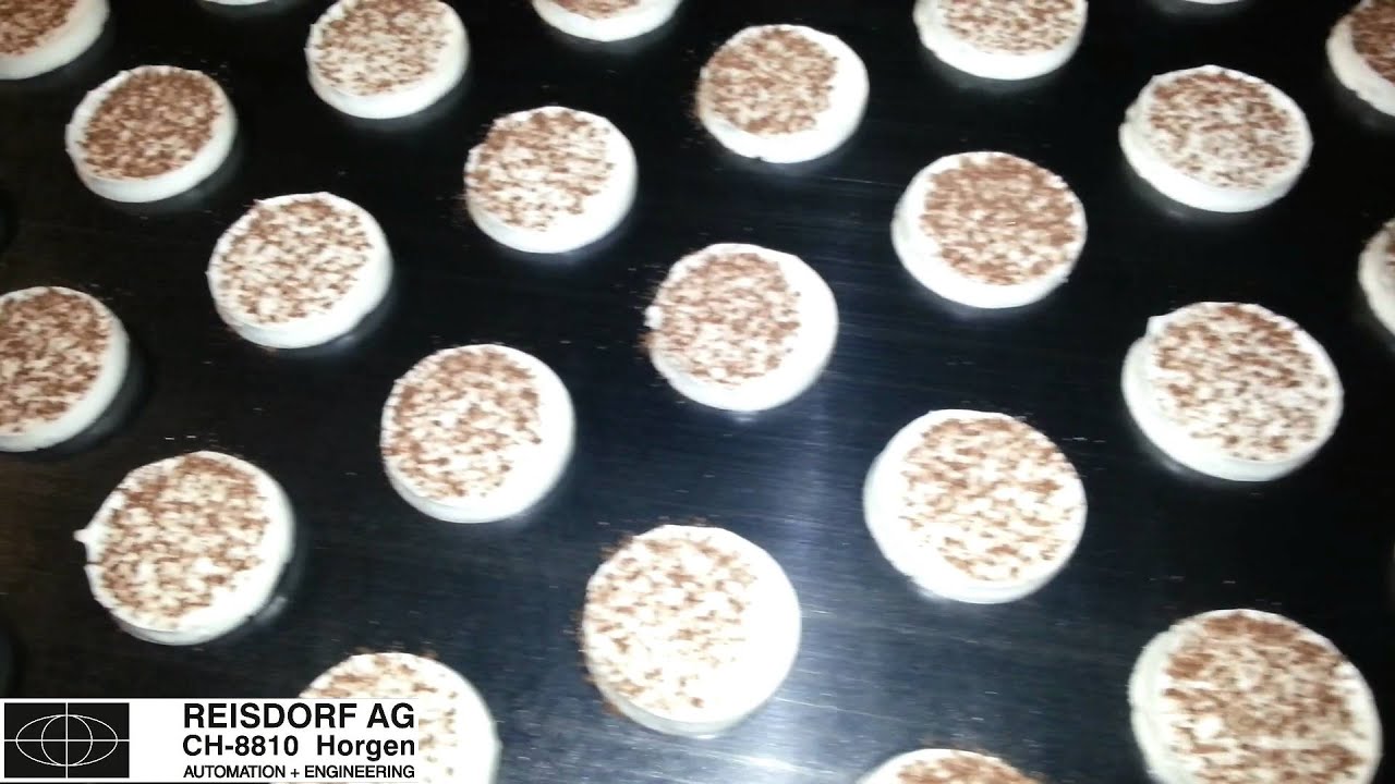 Rotary template depositor (RST) meringue biscuit production