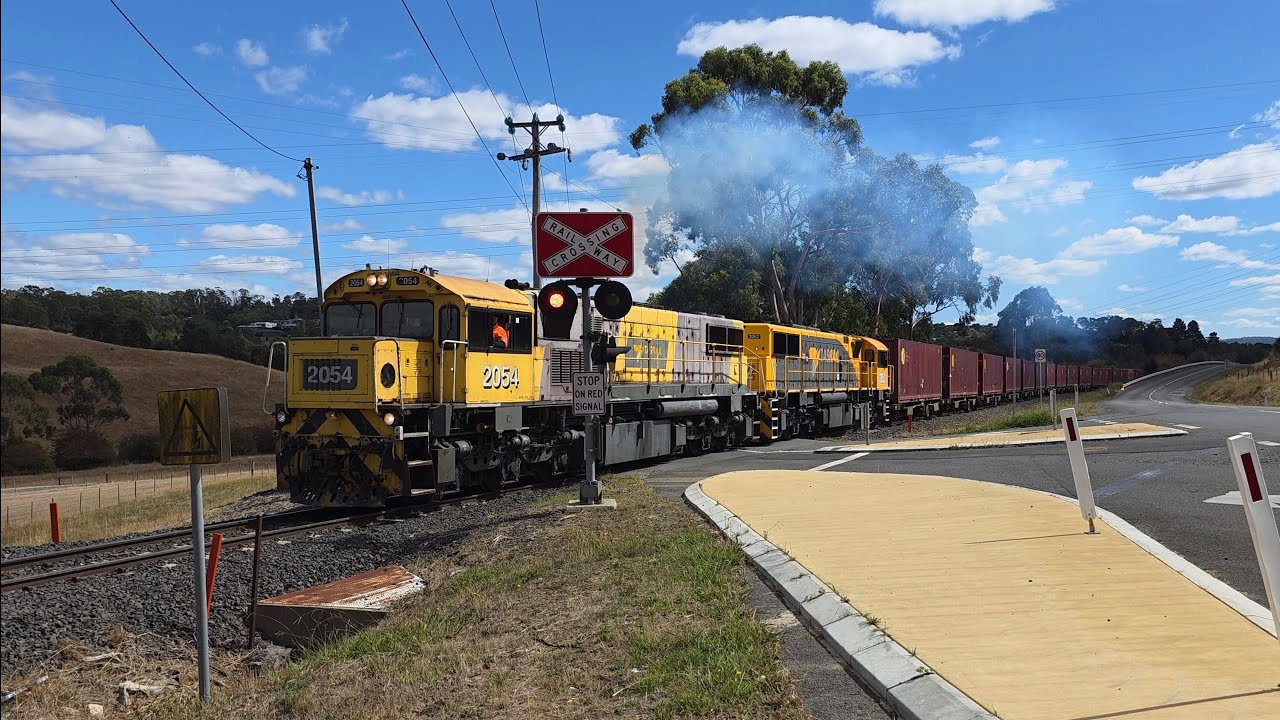 TasRail 2054 2052 #55 train crossing Opossum Road