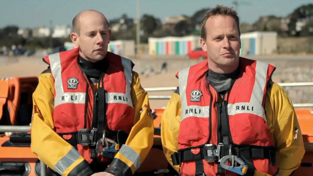 Exmouth RNLI volunteer awarded medal for rescue of four people from capsized powerboat