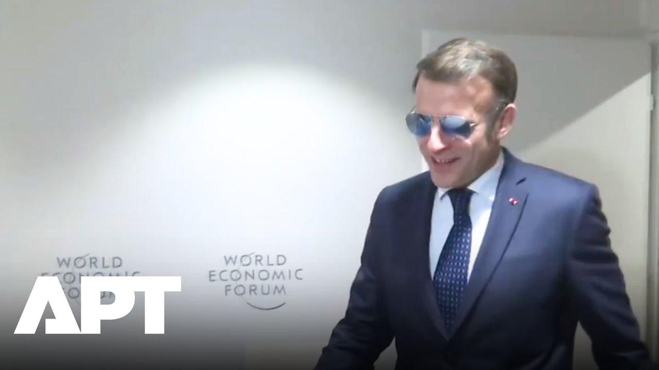 Момент с солнцезащитными очками: Макрон привлек всеобщее внимание по прибытии в Давос | APT