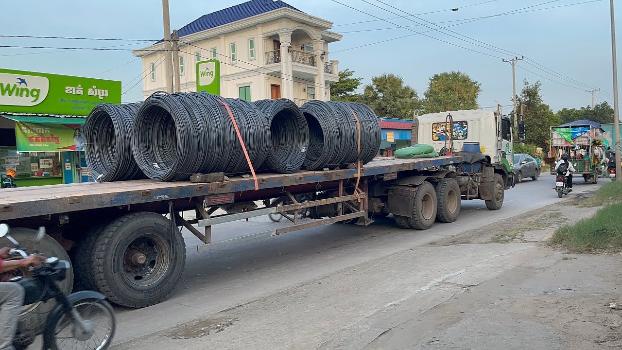 Look! This road is getting more and more congested every day because of the large trucks passing by