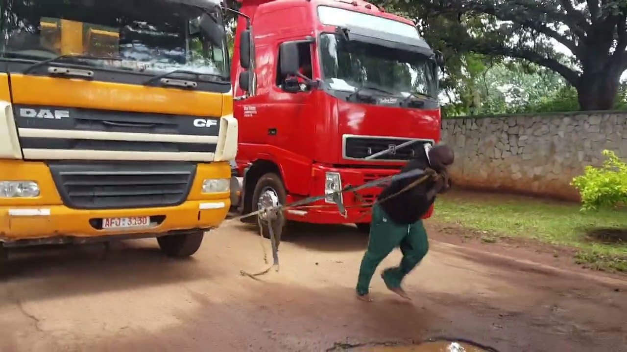 Zimbabwe's Strongest Man pulling 2 trucks