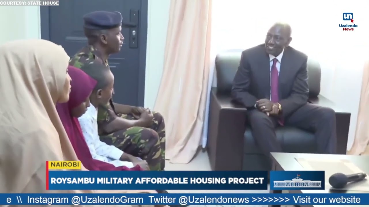 Ruto interacts with a Military Officer's family during the launch of the Military Housing Project