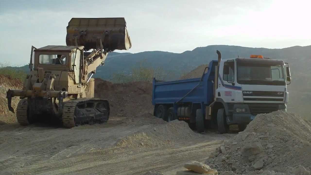 CAT977L LOADING DAF CF85