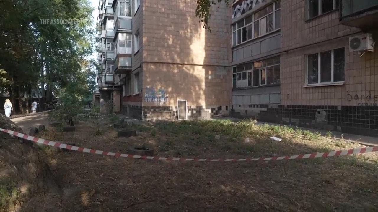 Rescuers and volunteers help after Russian missiles blast Poltava in Ukraine