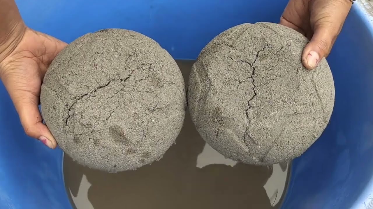 Gritty charcoalashes+sand cement crumbling in lots of water 💦💦