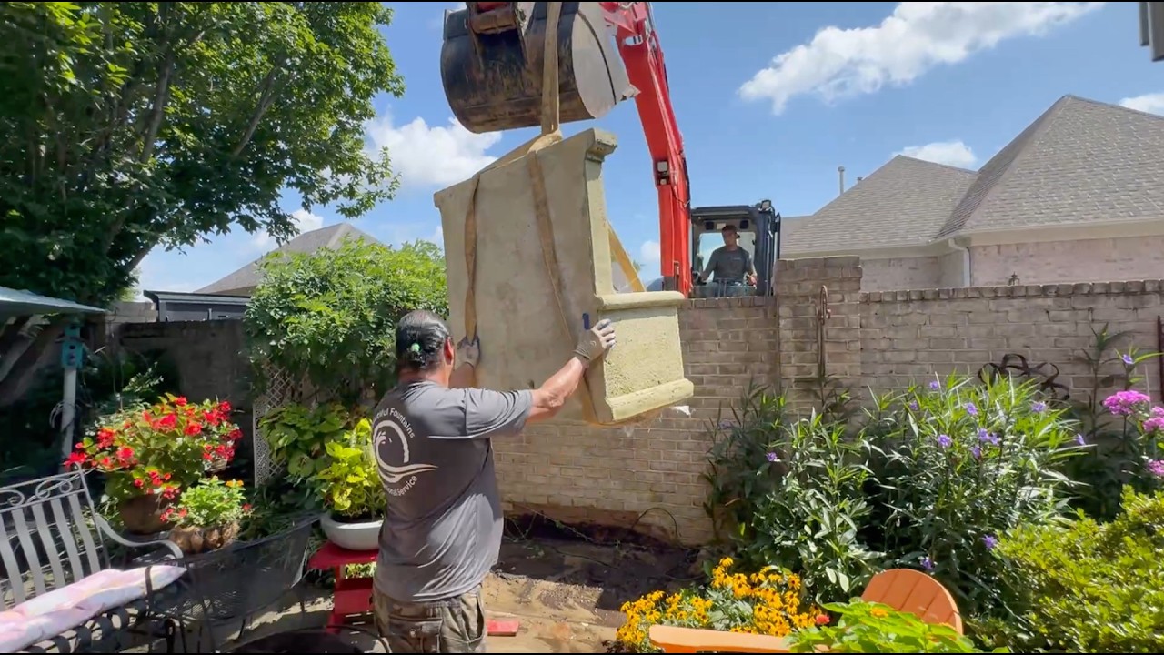 Installing a Wall Fountain in Tiny Flower Garden