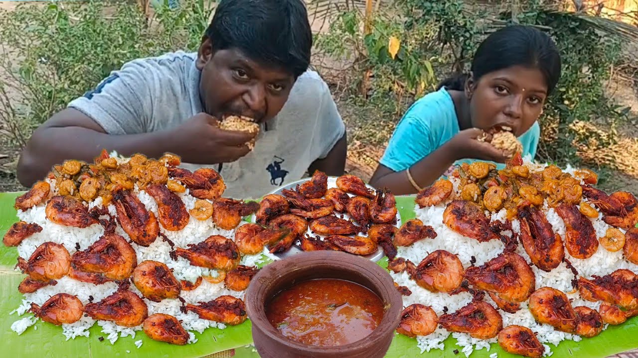 Unlimited Prawn fry and prawn gravy with white rice eating daddy and daughter