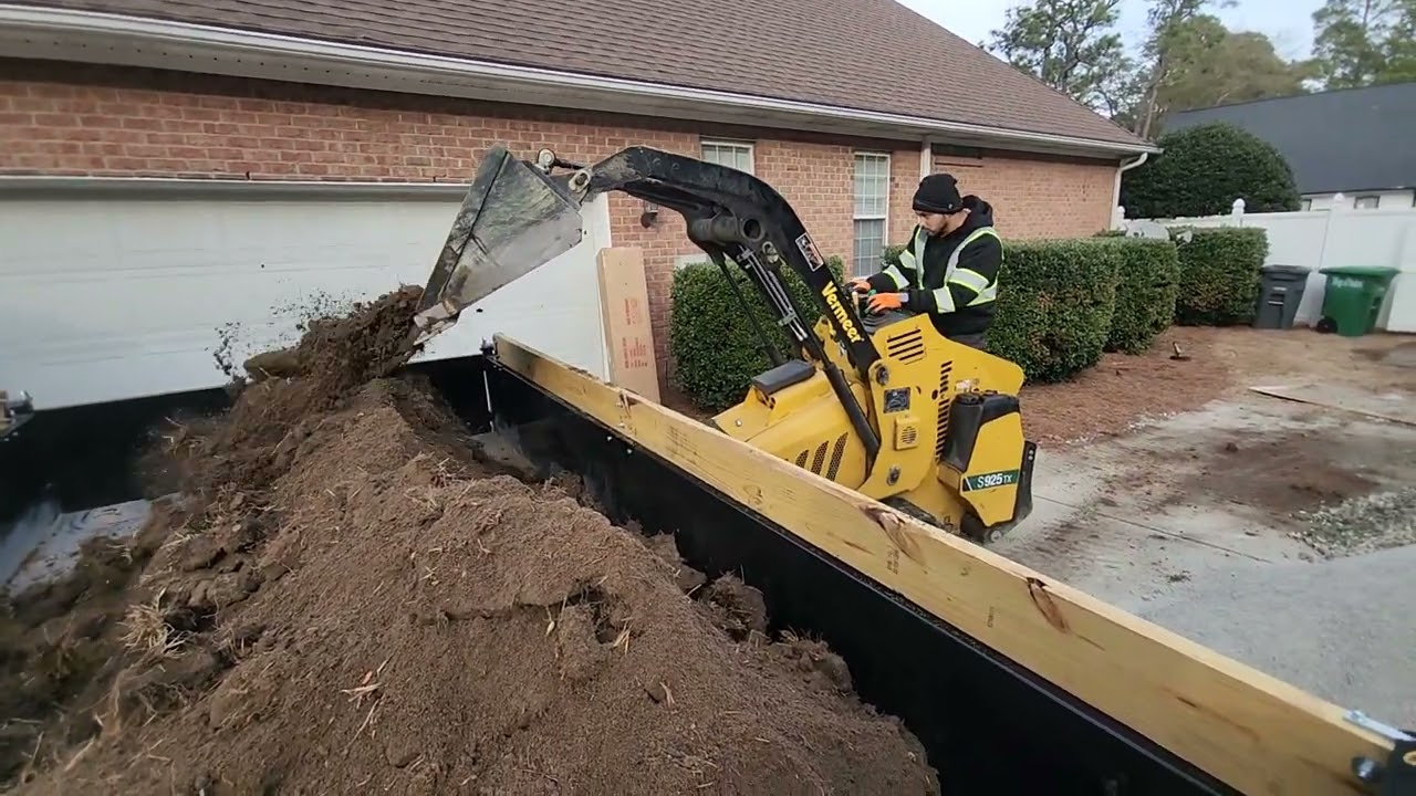 Hauling dirt for NEW customer with 6x12 dump trailer-customer loading