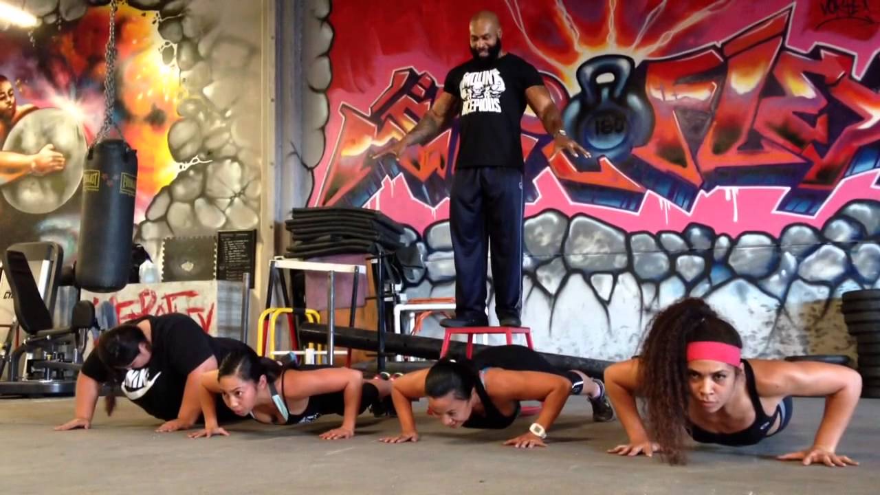 Push ups with CT Fletcher: female version