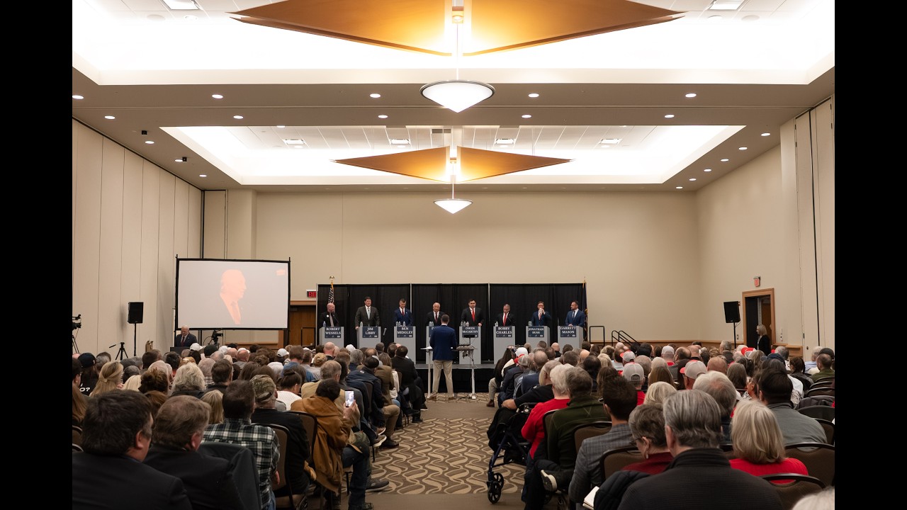 The Debate: A Clash in the Queen City