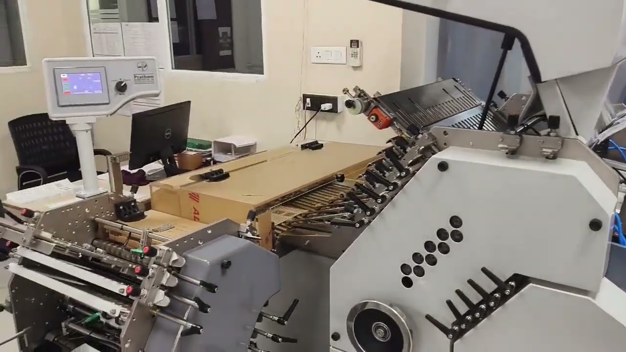 Introducing the Superfold Outsert Folding Machine - RPF-53/10, a true multitasking marvel!