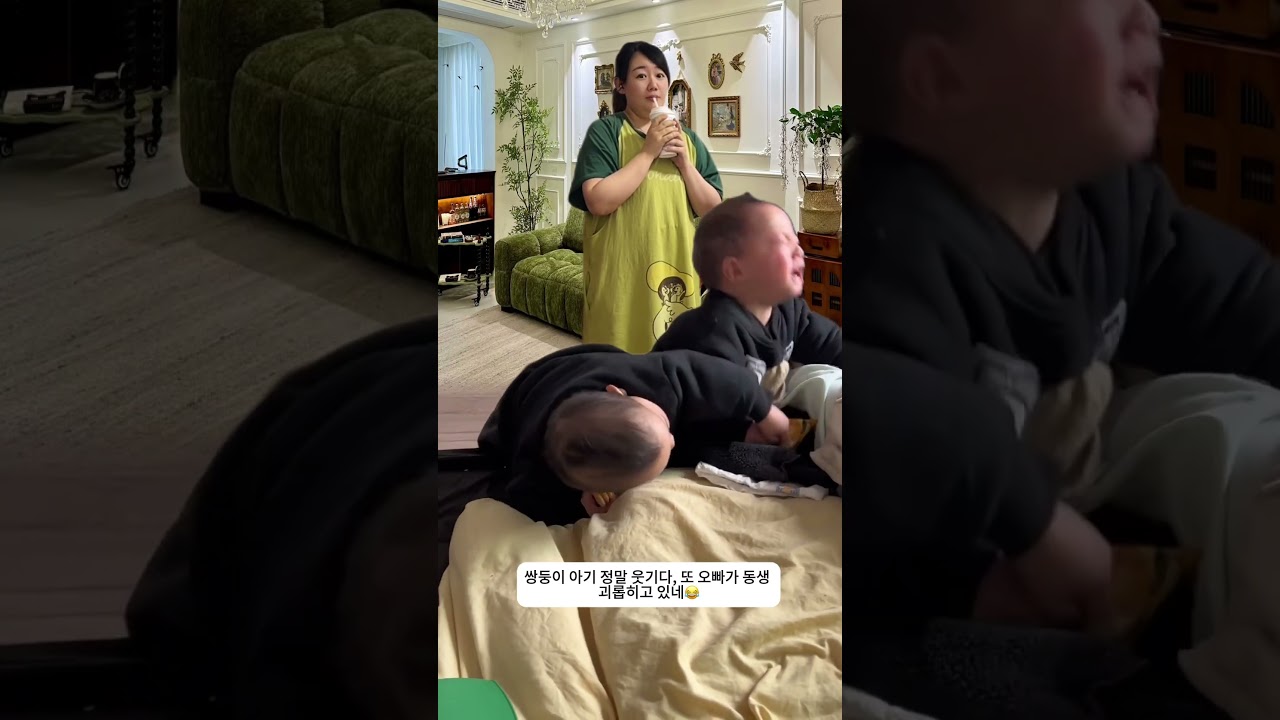 The twin babies are so funny—big brother is picking on little brother again