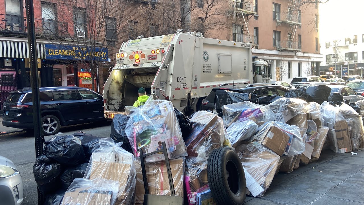 DSNY Garbage Truck Crushing a Massive Trash Bag Pile
