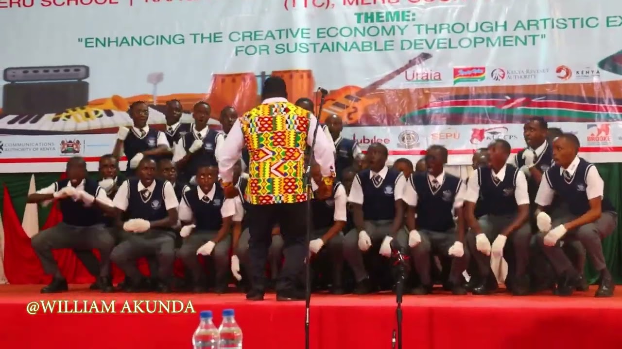 NGENIA HIGH SCHOOL CHOIR perfoming 1er gaou By Magic system at the Kmf 2025 Meru county edition.