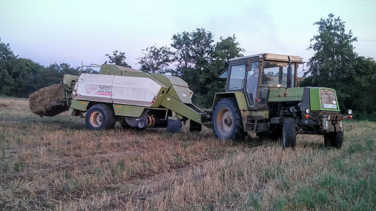 Belarus MTS 82 und Fortschritt ZT 320-A mit der GBP 550 beim Strohpressen