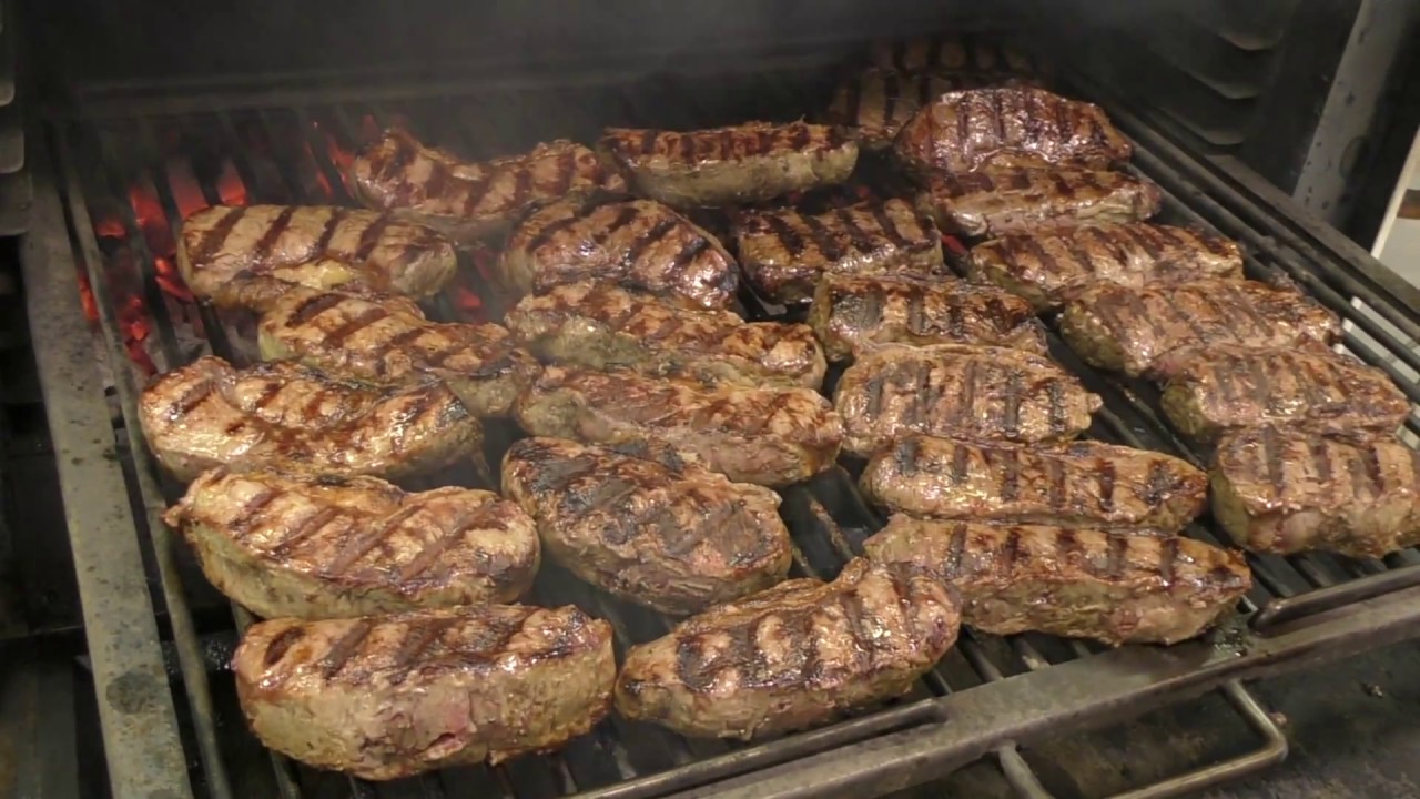 Prepare succulent, juicy steak over hot coals in the MIBRASA charcoal BBQ oven