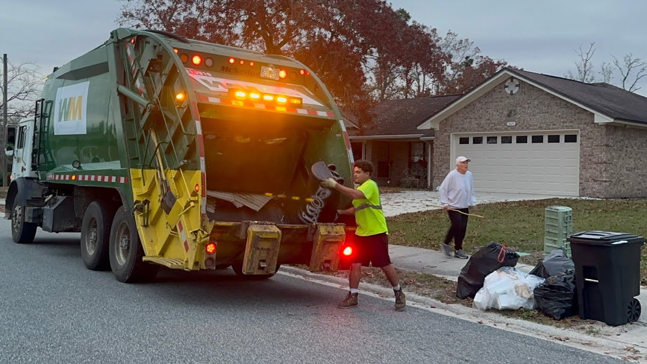 WM Rear Loader Garbage Truck Packing Post Christmas Trash