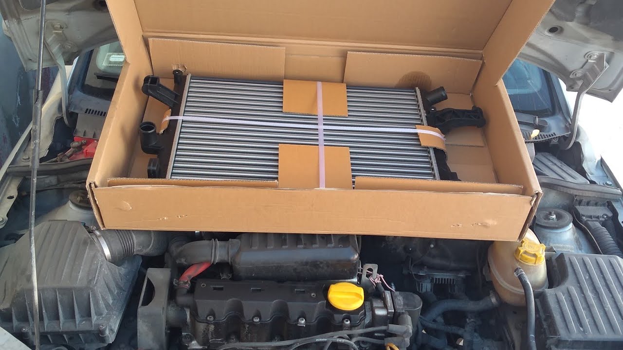 Cambio de radiador de Chevrolet Corsa con aire acondicionado