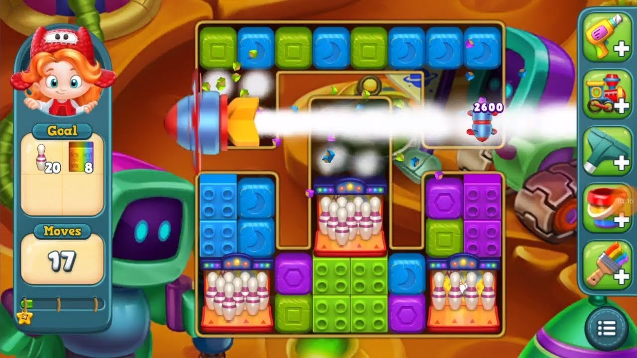 Toy Blast Level 589 obstacles: 30 white bowling pins and 12 colored lego blocks