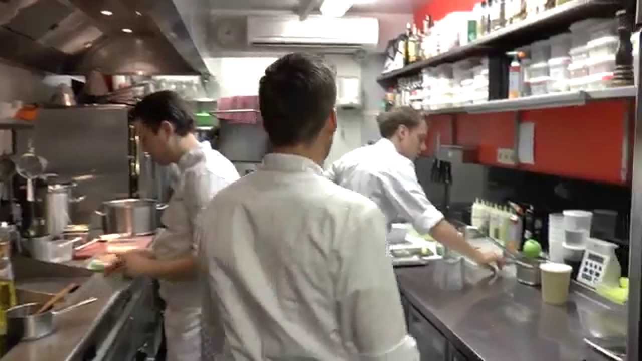 Micha&euml;l Vrijmoed prepares a dessert at his Michelin star restaurant in Belgium