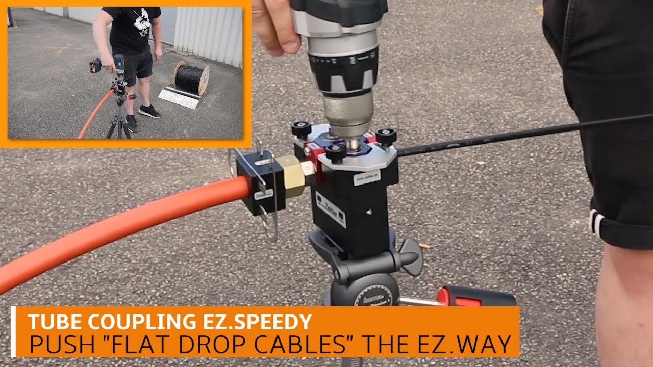 Installation of Flat Drop Cable with pusher and power drill