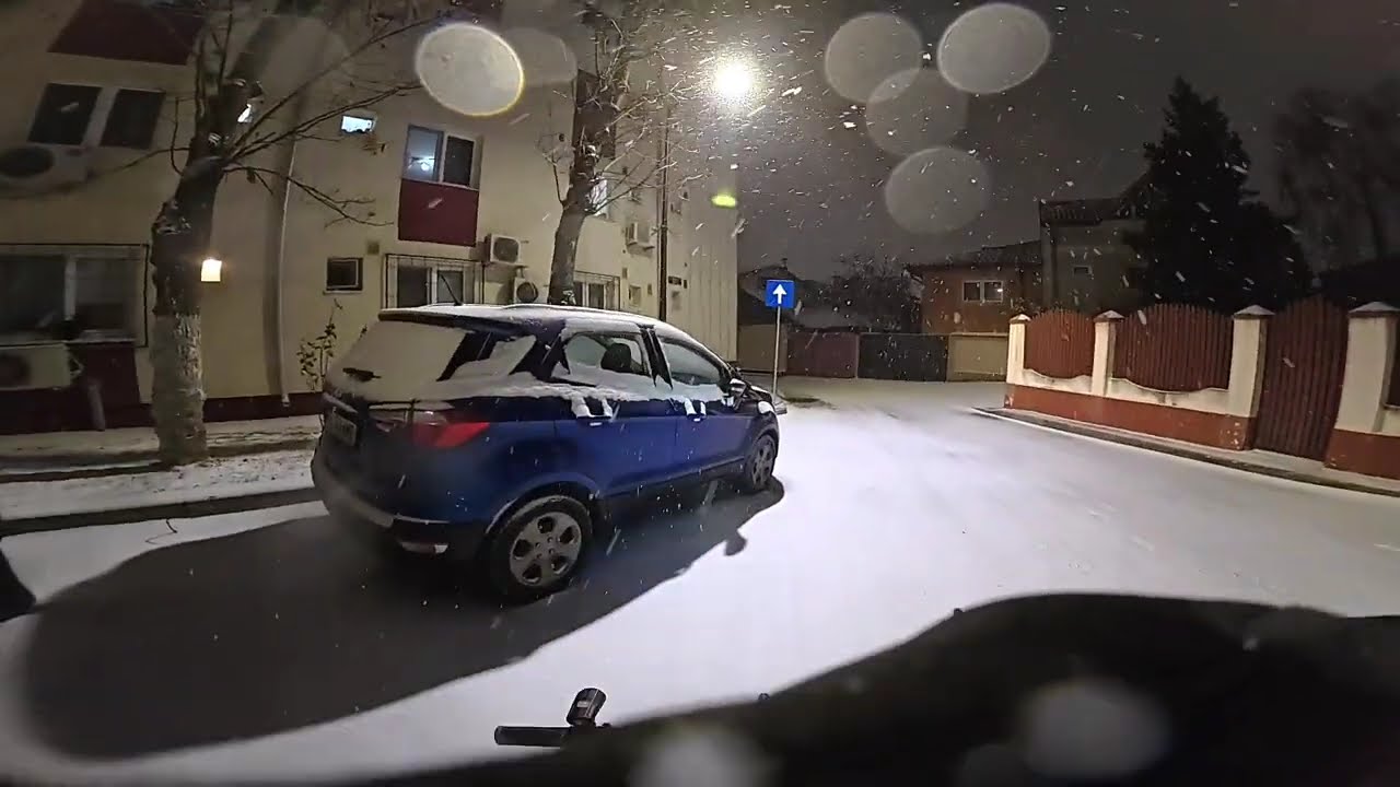 Chill ride over a surprise snow in Bucharest.