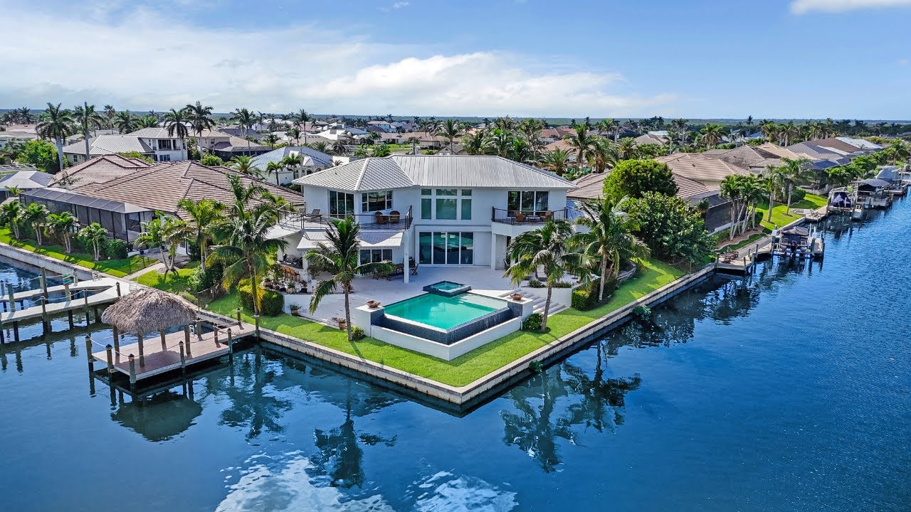 Luxury Waterfront Home in SW Cape Coral | Custom-Built Gulf Access Home with Infinity Pool!