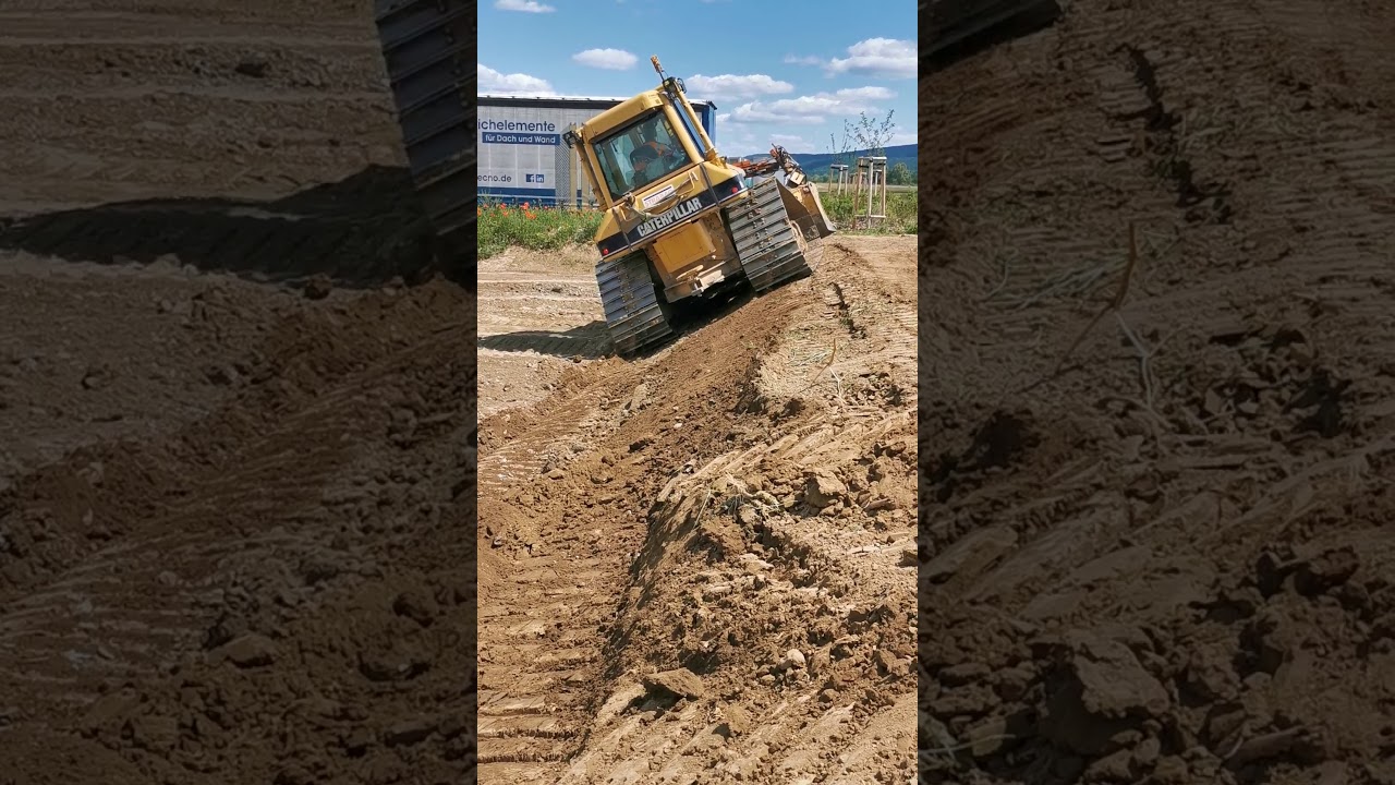 Cat D5 LGP schiebt Böschung